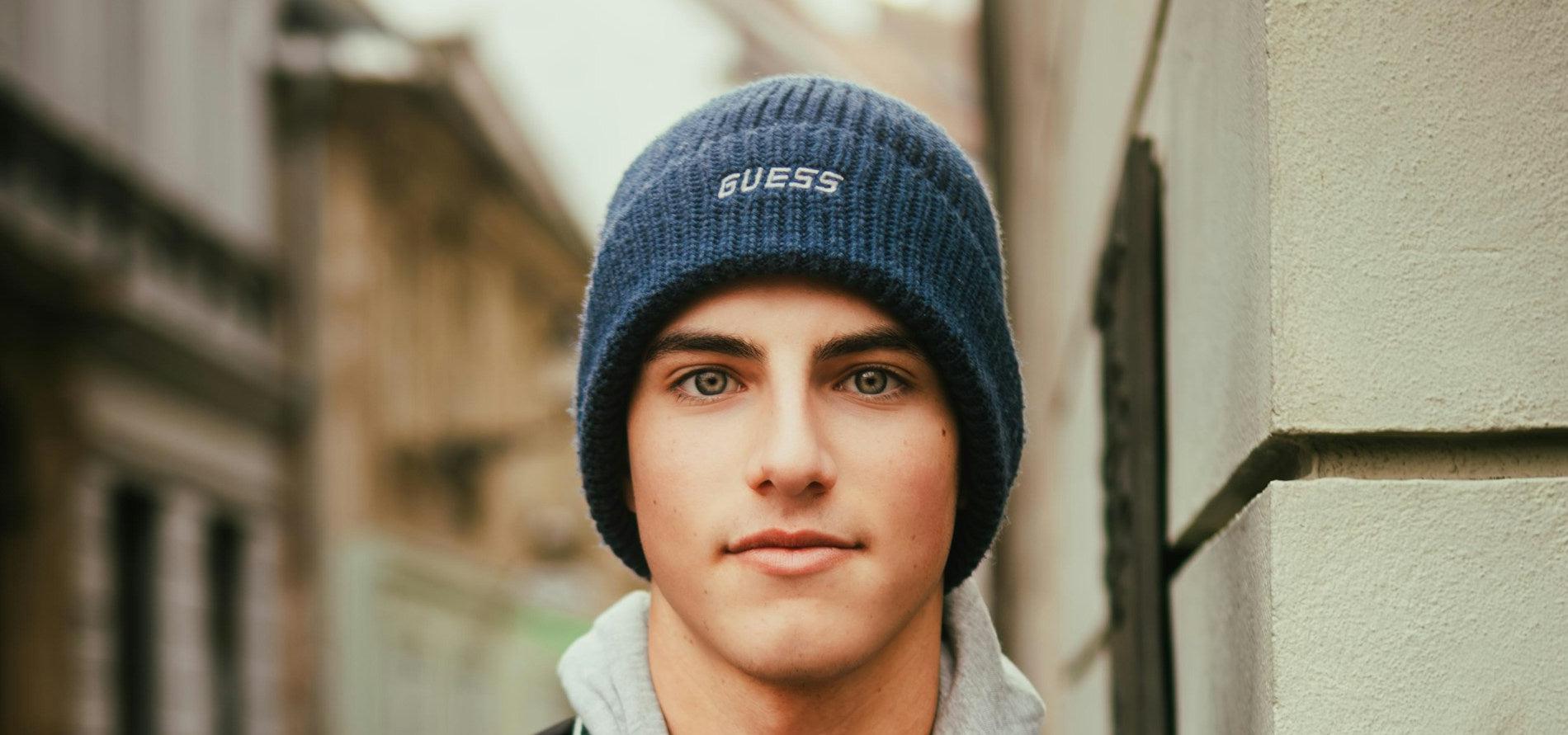 young man in a knit hat