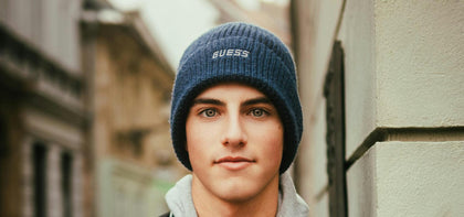 young man in a knit hat