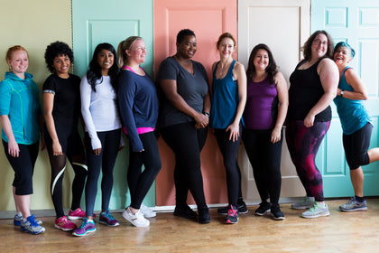 a group of women in a horizontal line