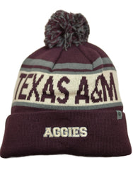 Maroon beanie with pom-pom and 'Texas A&M Aggies' text on a white background